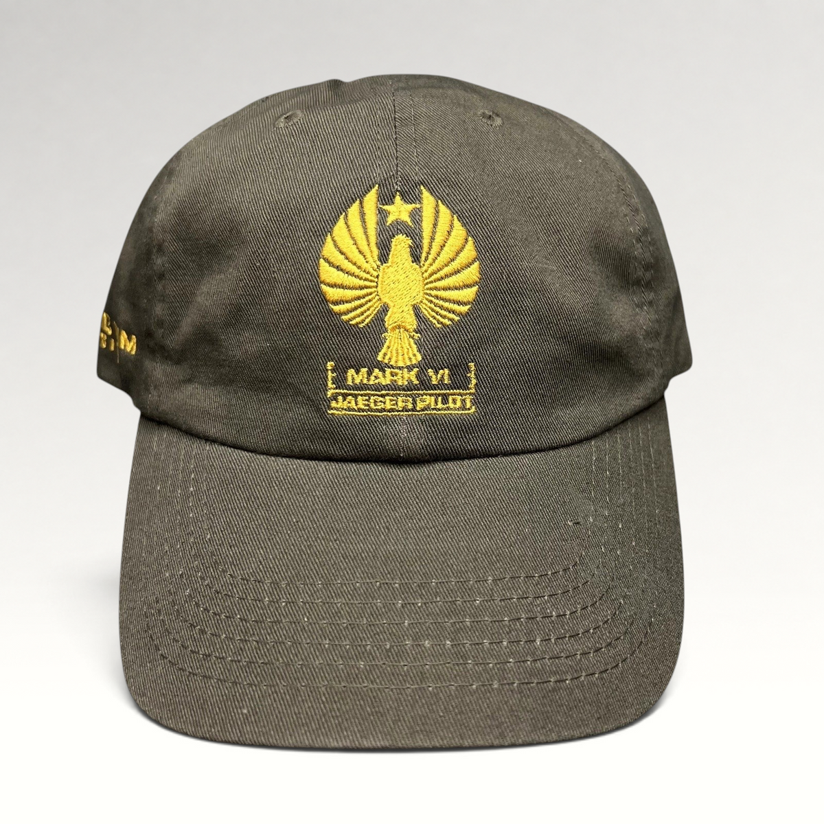 Raree Finds Pacific Rim Uprising olive drab cotton strapback hat with gold embroidered Mark VI Jaeger Pilot insignia