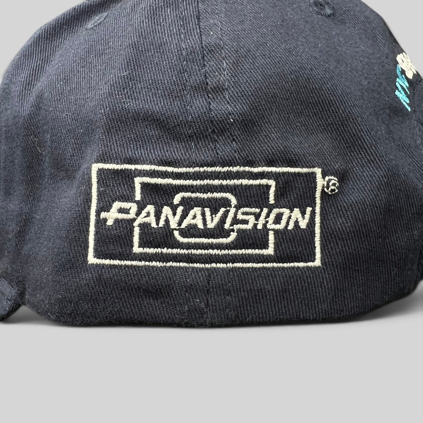 Raree Finds navy blue cotton strapback hat featuring a white embroidered Panavision logo on the side panel