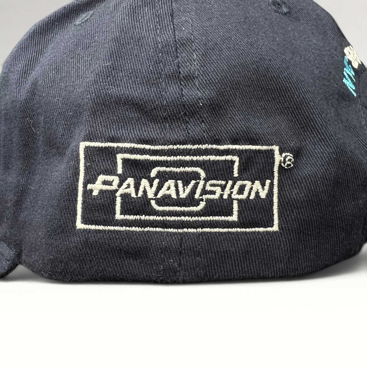 Raree Finds navy blue cotton strapback hat featuring a white embroidered Panavision logo on the side panel
