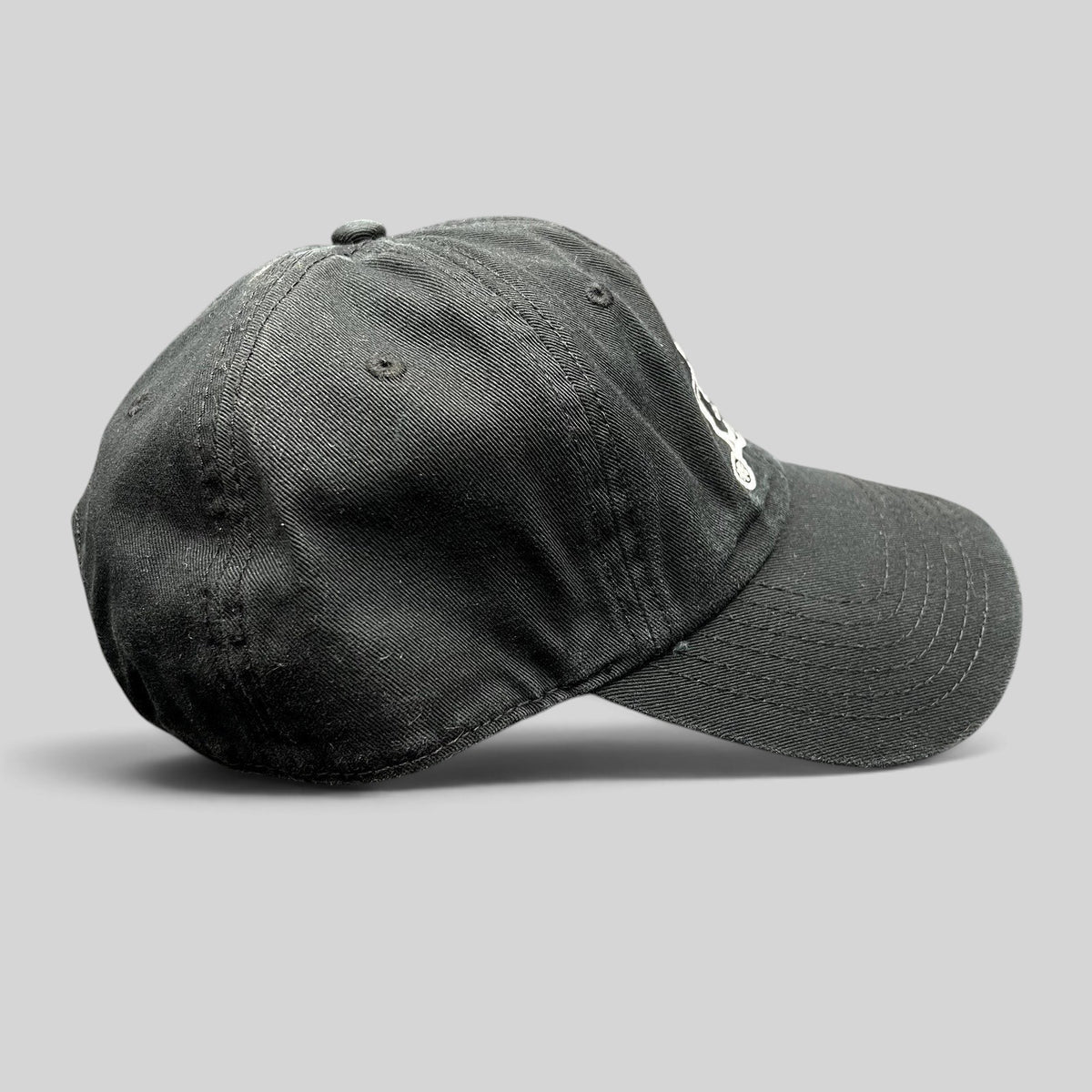 Raree Finds black cotton strapback hat with white Panic! At The Disco exclamation mark embroidery on the front