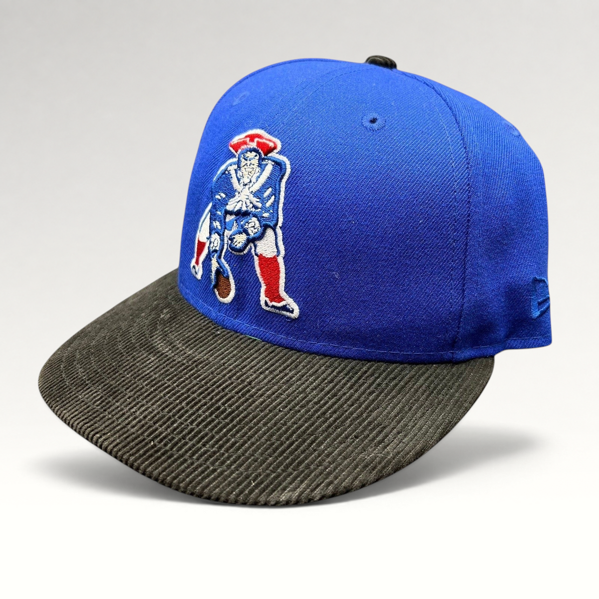 Raree Finds New England Patriots 59FIFTY fitted hat with royal blue crown and black corduroy brim featuring Pat Patriot