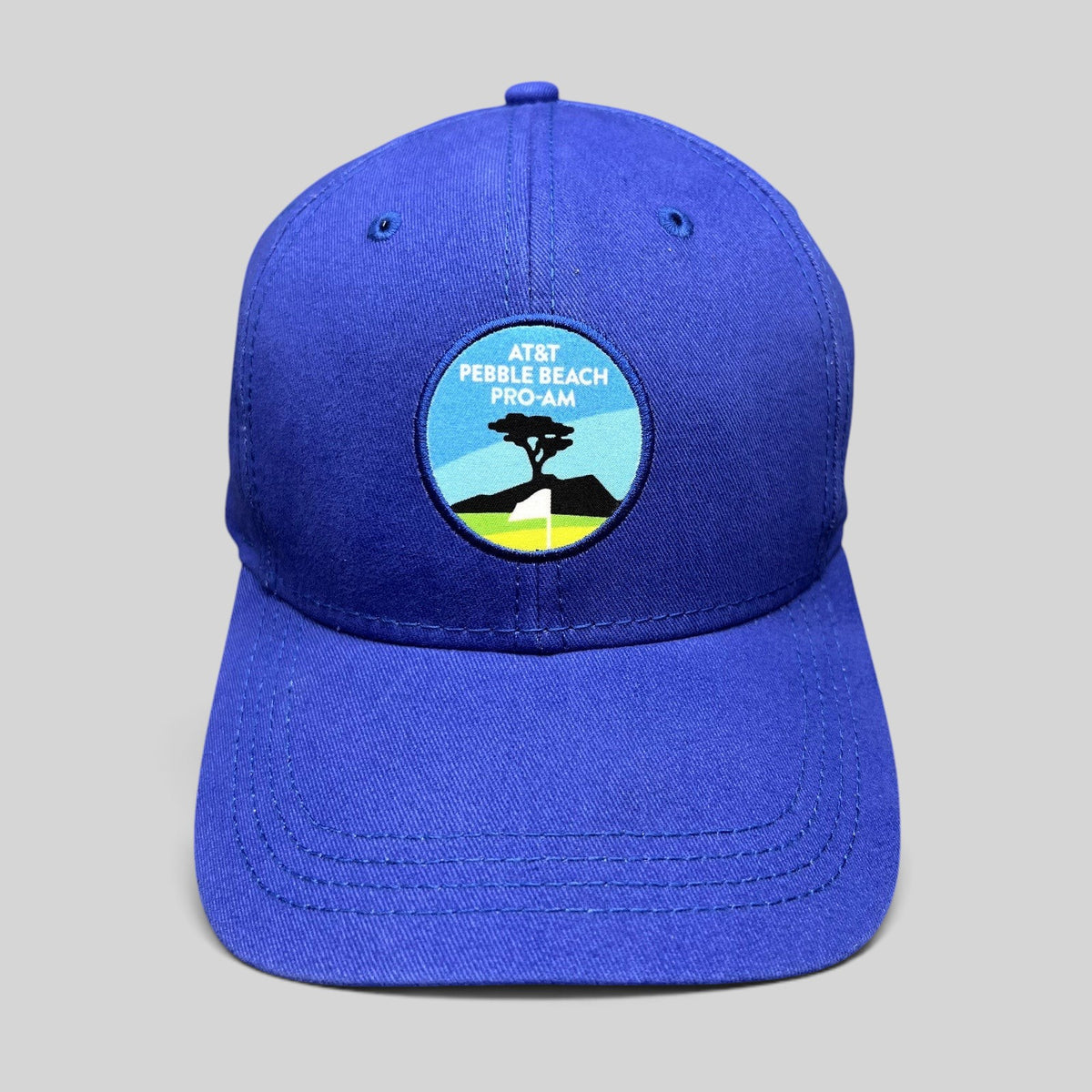 Raree Finds royal blue AT&T Pebble Beach Pro-Am golf hat with embroidered Lone Cypress tournament logo patch