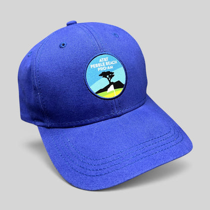 Raree Finds royal blue AT&T Pebble Beach Pro-Am golf hat with embroidered Lone Cypress logo patch and curved brim.