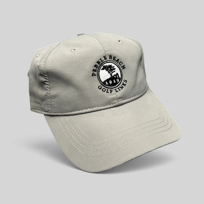 Raree Finds gray performance fabric golf cap with embroidered Pebble Beach Golf Links 1919 logo and strapback closure.