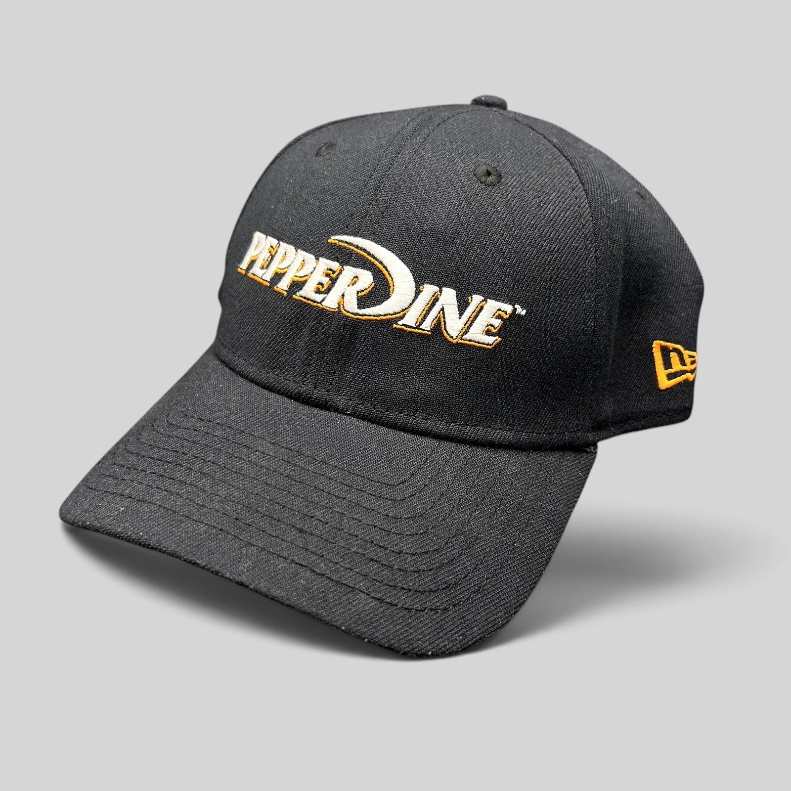 Raree Finds navy Pepperdine Waves New Era 39THIRTY flex fit cap with embroidered front logo and curved bill