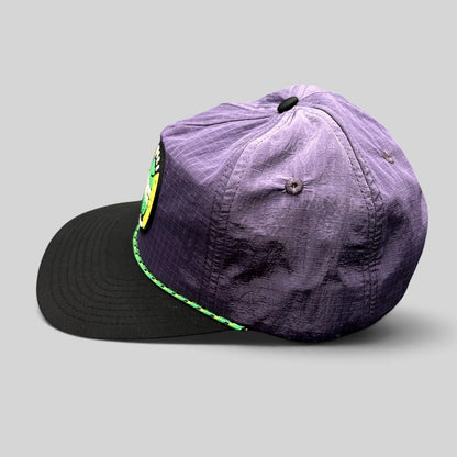 Raree Finds Phish Sphere 2026 purple ripstop nylon snapback hat with black flat bill and green rope detail.