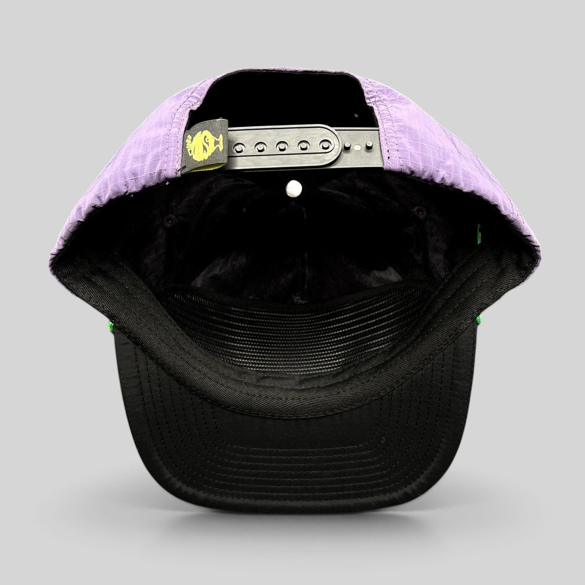 Raree Finds Phish Sphere 2026 snapback hat showing the interior purple ripstop nylon and black adjustable strap
