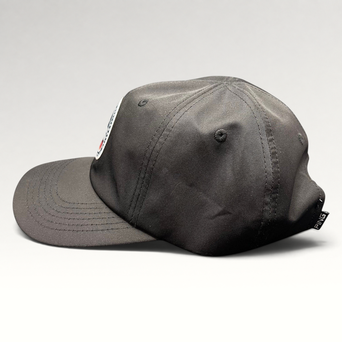 Raree Finds PING black SensorCool golf hat with circular embroidered patch logo and adjustable strapback closure