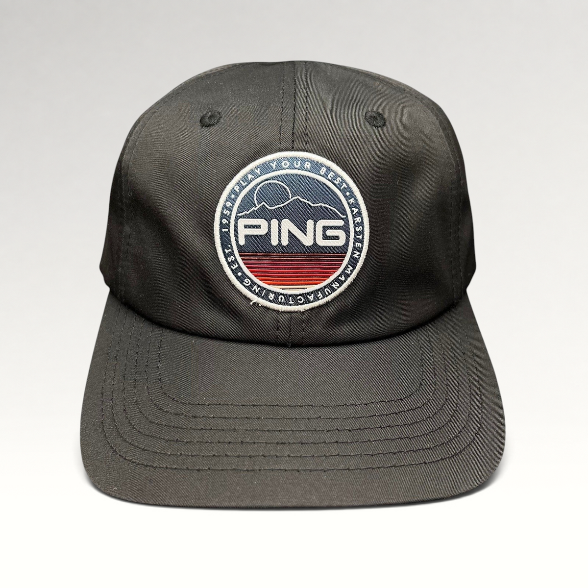 Raree Finds PING black golf strapback hat with a circular embroidered mountain patch logo and SensorCool fabric.