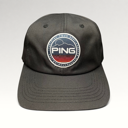 Raree Finds PING black golf strapback hat with a circular embroidered mountain patch logo and SensorCool fabric.