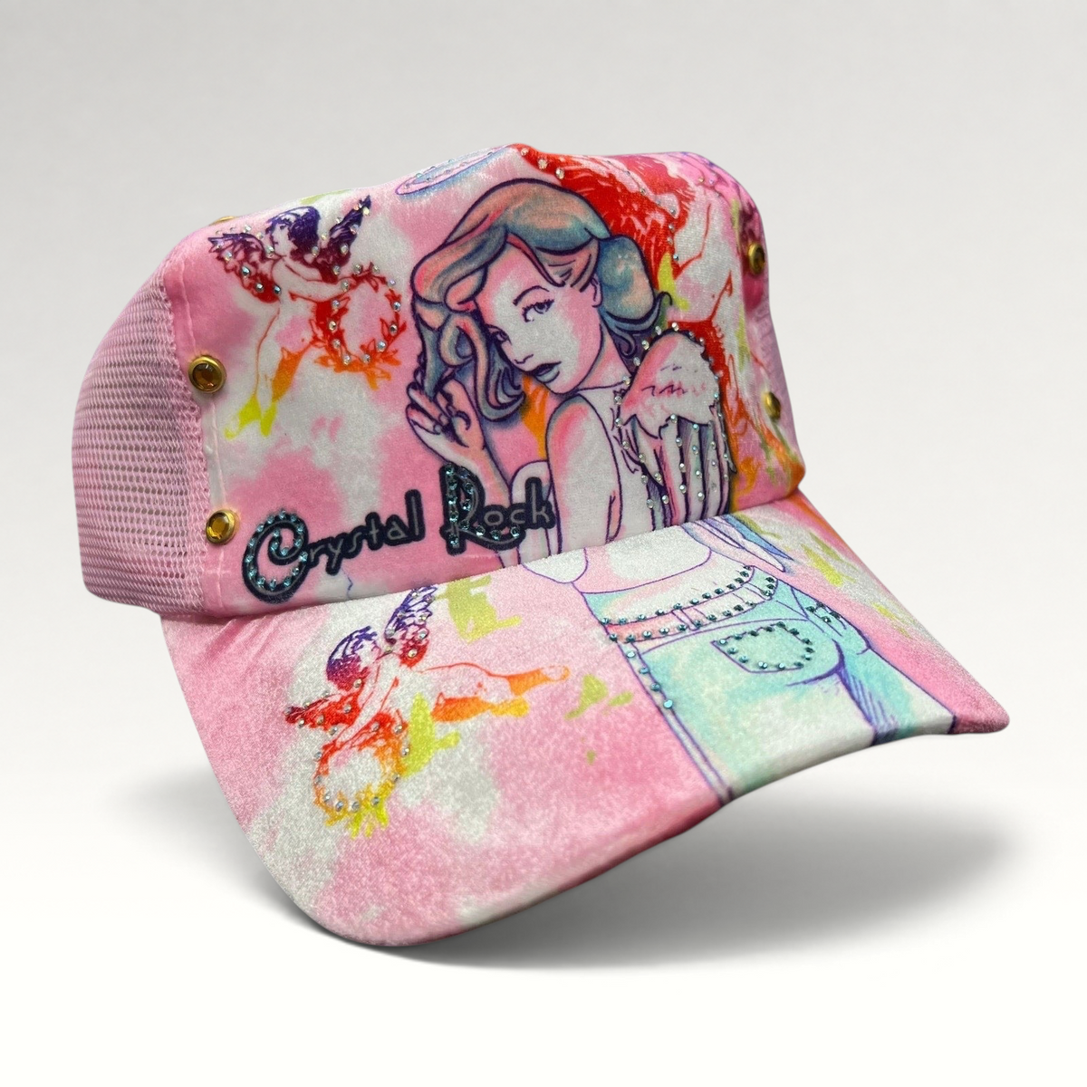 Raree Finds Crystal Rock by Christian Audigier pink trucker hat with angel graphic, rhinestones, and metallic studs.