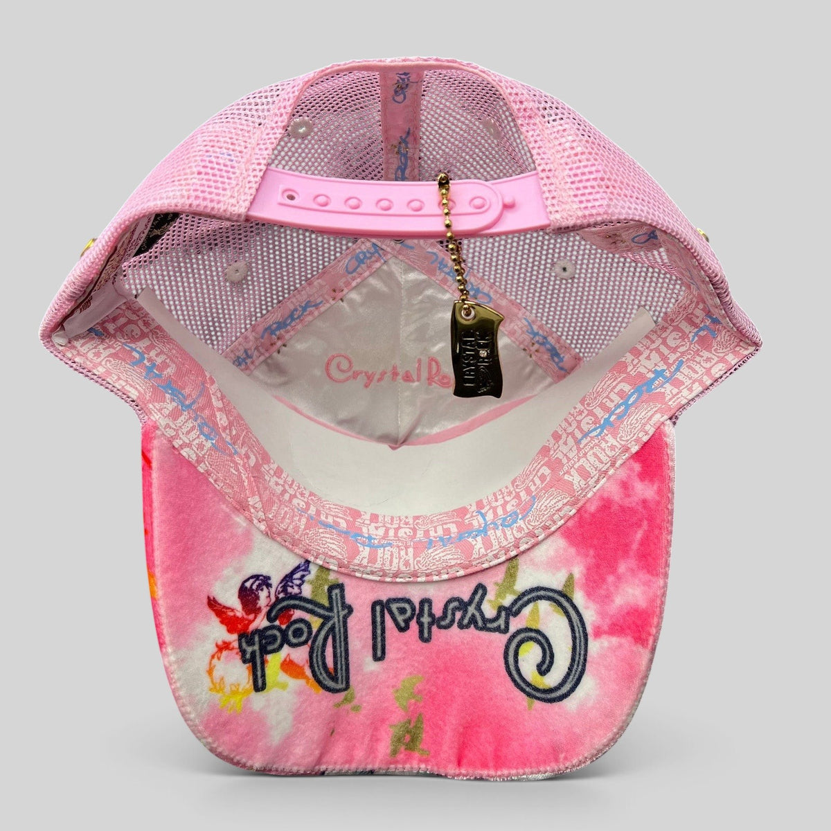 Raree Finds Crystal Rock by Christian Audigier pink Y2K trucker hat with interior branding and snapback closure