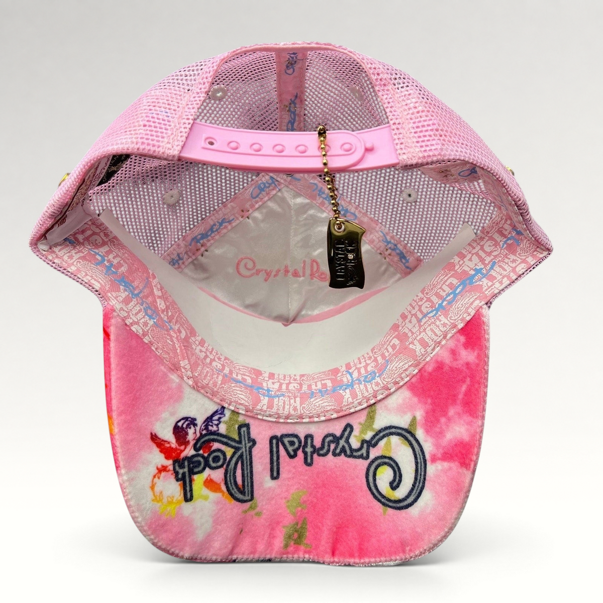 Raree Finds Crystal Rock by Christian Audigier pink Y2K trucker hat with interior branding and snapback closure