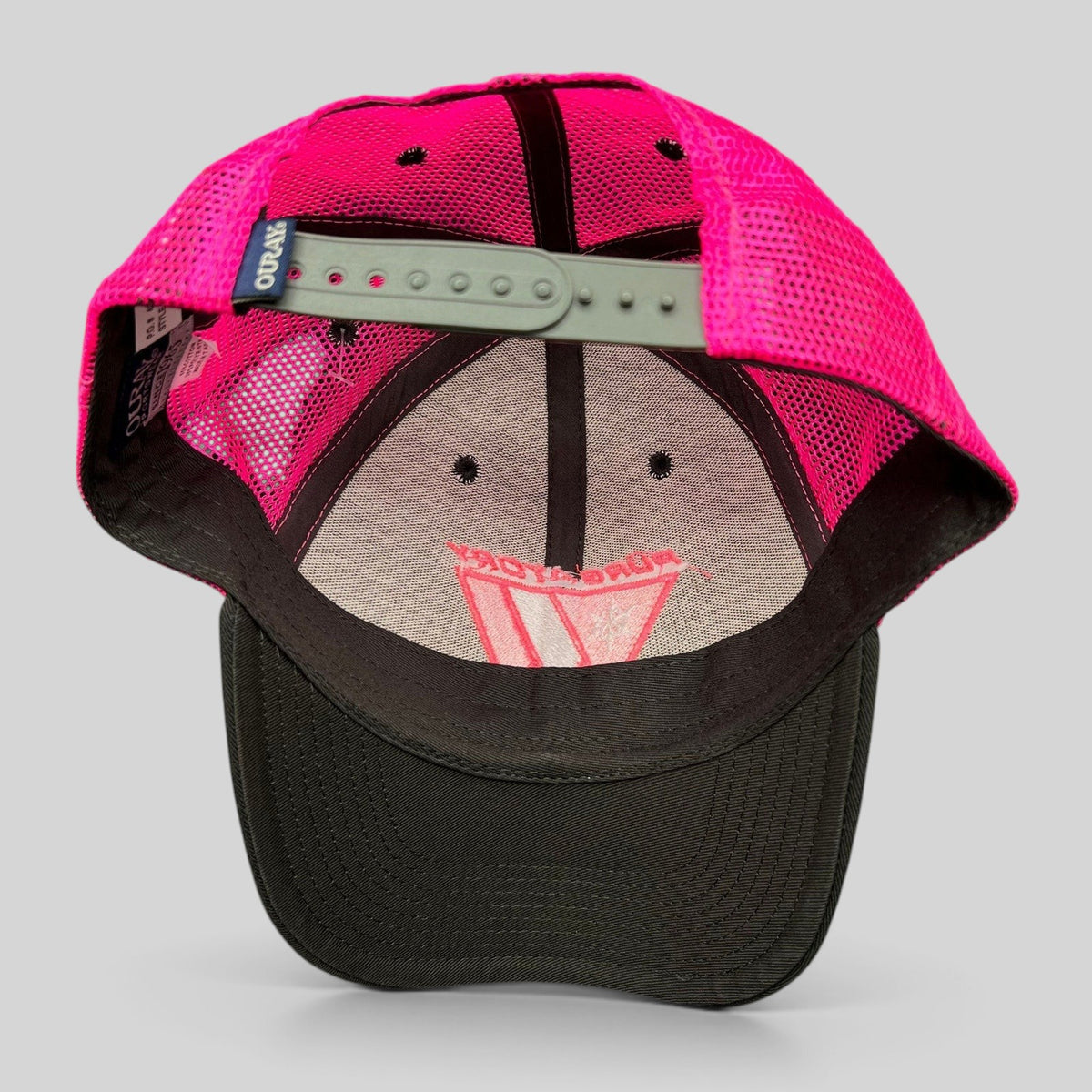 Raree Finds vintage 90s Purgatory Racing snapback hat with neon pink mesh back and black cotton brim