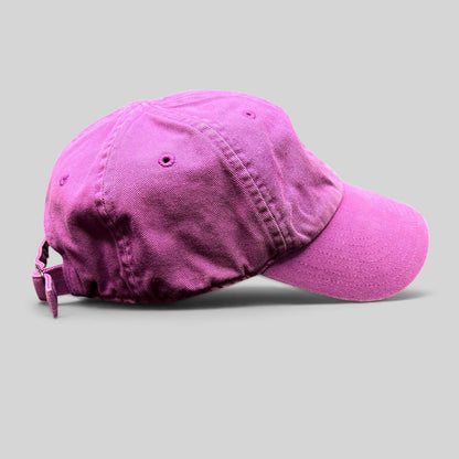 Raree Finds Nike Heritage86 pink cotton twill strapback hat with a curved brim and unstructured relaxed fit