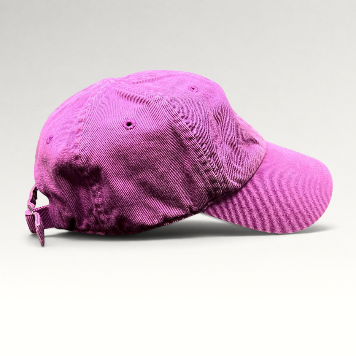 Raree Finds Nike Heritage86 pink cotton twill strapback hat with a curved brim and unstructured relaxed fit