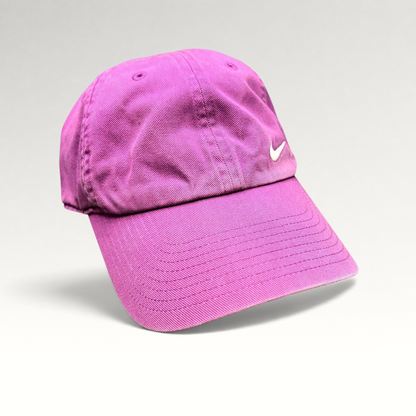 Raree Finds Nike Heritage86 pink cotton twill strapback hat with an embroidered white Swoosh logo and curved brim.