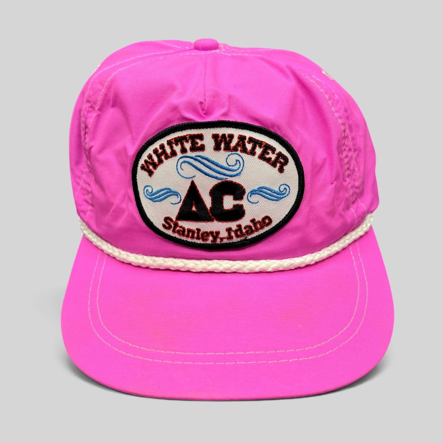 Raree Finds vintage neon pink nylon Imperial strapback hat with White Water AC Stanley Idaho patch and white rope