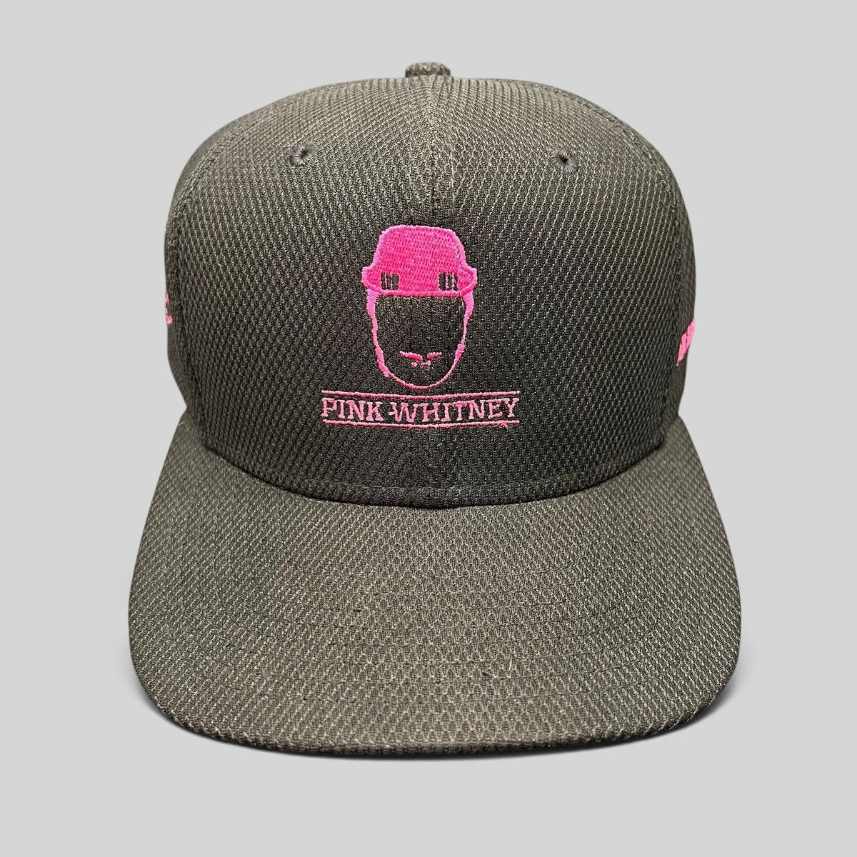Raree Finds black New Era 9FIFTY snapback hat with pink Pink Whitney logo embroidery and structured flat brim