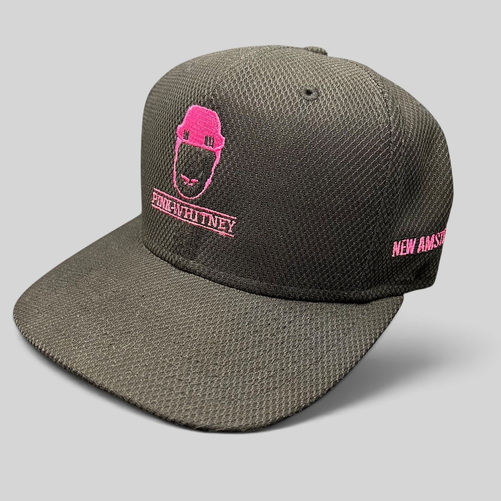 Raree Finds black New Era 9FIFTY snapback hat with pink Pink Whitney logo embroidery and flat brim