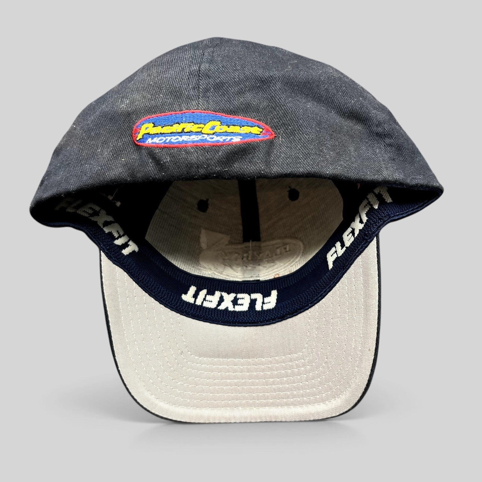 Raree Finds vintage black Playboy Racing Flexfit hat with Pacific Coast Motorsports embroidery on the inner brim