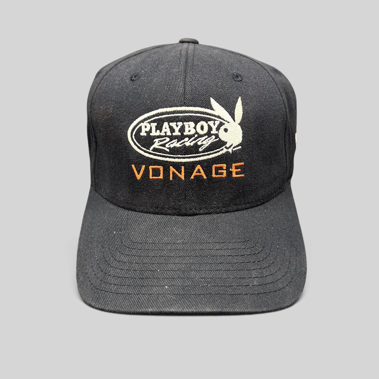 Raree Finds black Playboy Racing Vonage embroidered Flexfit baseball cap with structured stretch-fit design