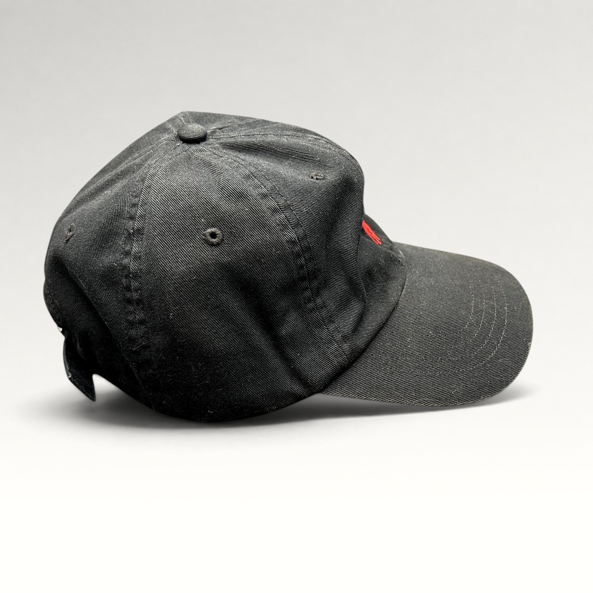 Raree Finds Polo Ralph Lauren black cotton twill strapback hat with red embroidered pony logo, side profile view.