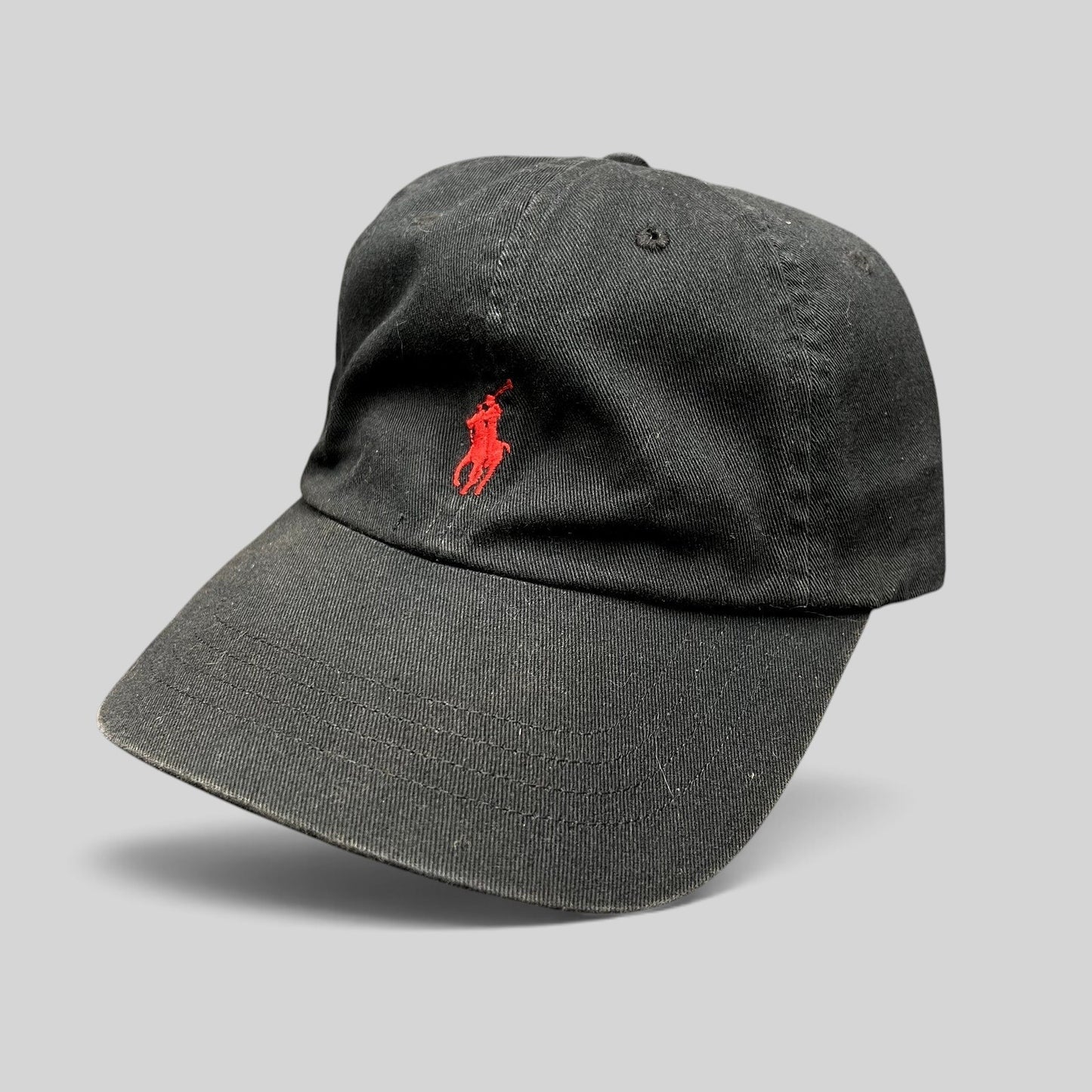 Raree Finds Polo Ralph Lauren black cotton strapback hat with a red embroidered pony logo on the front crown.