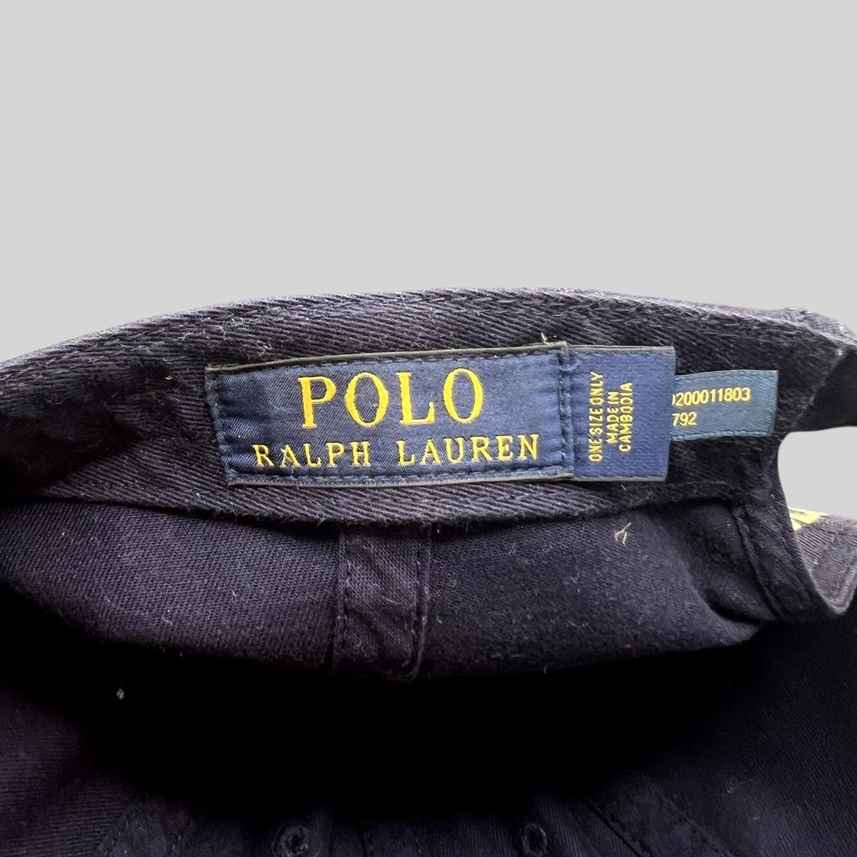 Raree Finds navy cotton Polo Ralph Lauren cap interior label with yellow branding and origin details