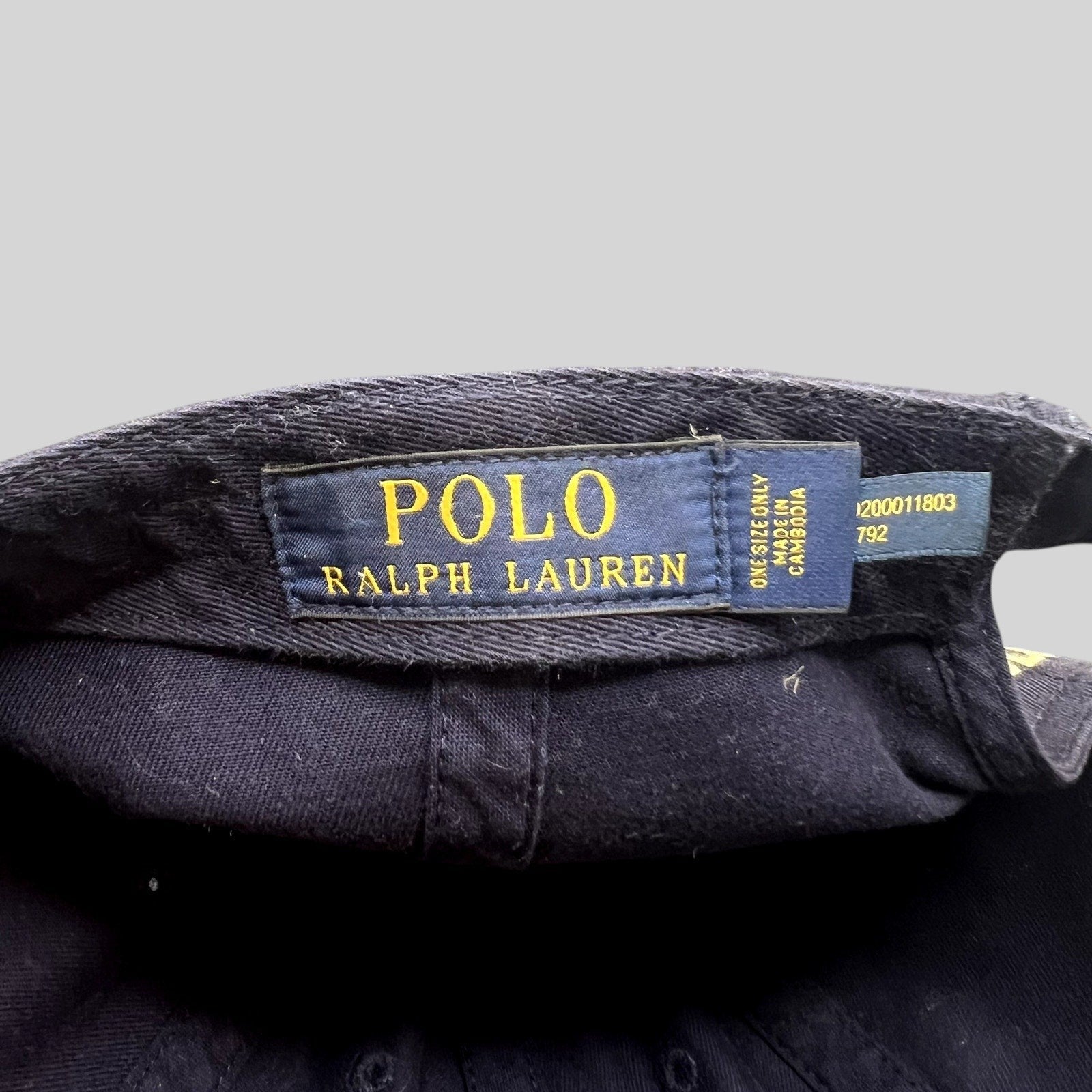 Raree Finds navy cotton Polo Ralph Lauren cap interior label with yellow branding and origin details