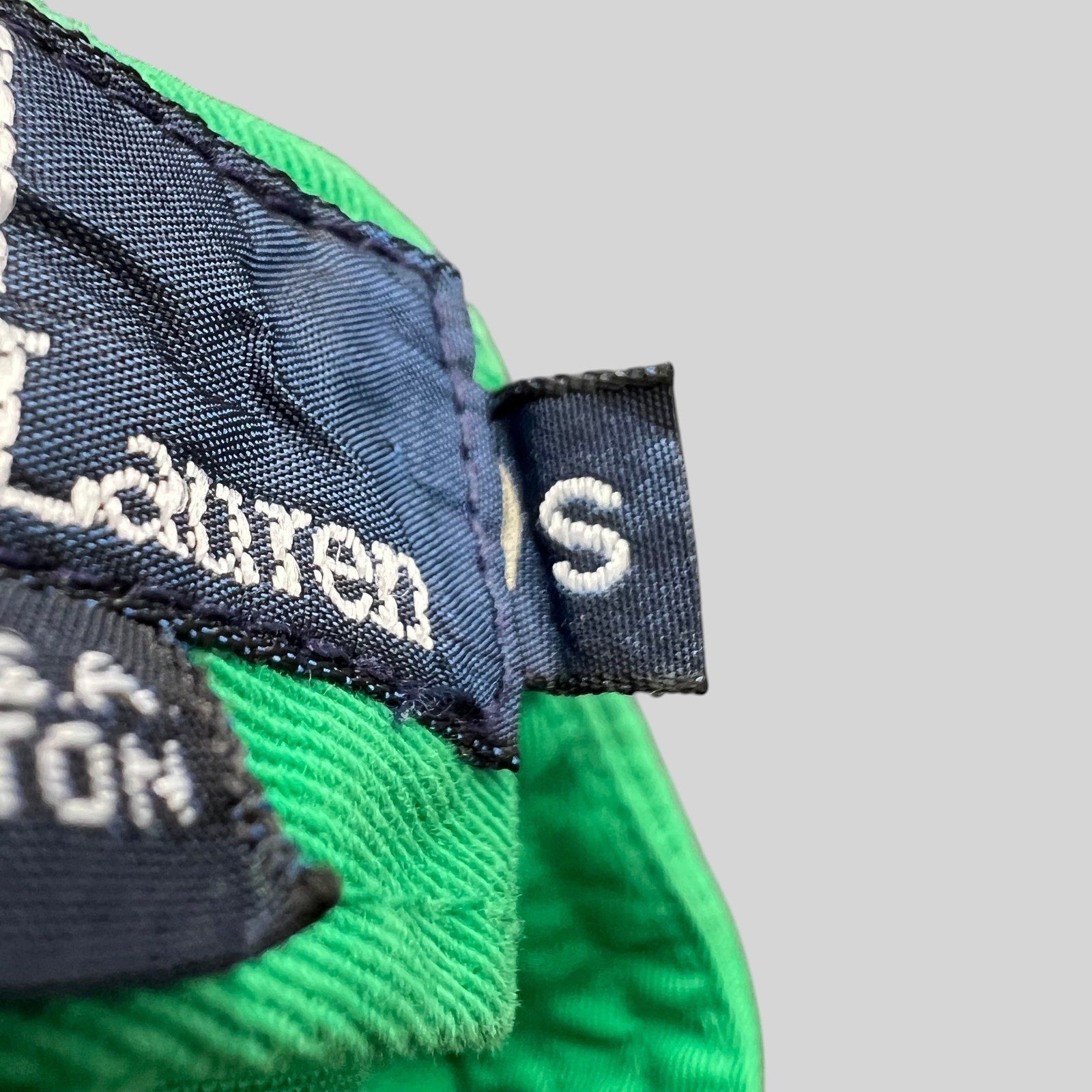 Raree Finds vintage Polo Ralph Lauren fitted hat interior tag showing size small and brand label on green cotton