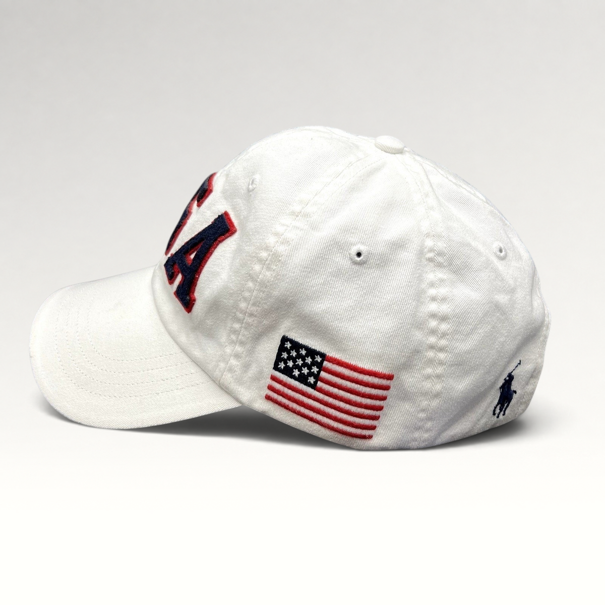 Raree Finds white Polo Ralph Lauren Team USA Olympic strapback hat with navy and red felt lettering and side flag