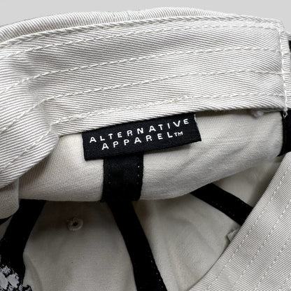 Raree Finds Porsche Driving Experience hat interior featuring an Alternative Apparel brand label on cream fabric