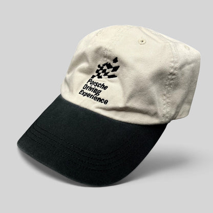 Raree Finds Porsche Driving Experience two-tone strapback hat in black and cream with embroidered logo