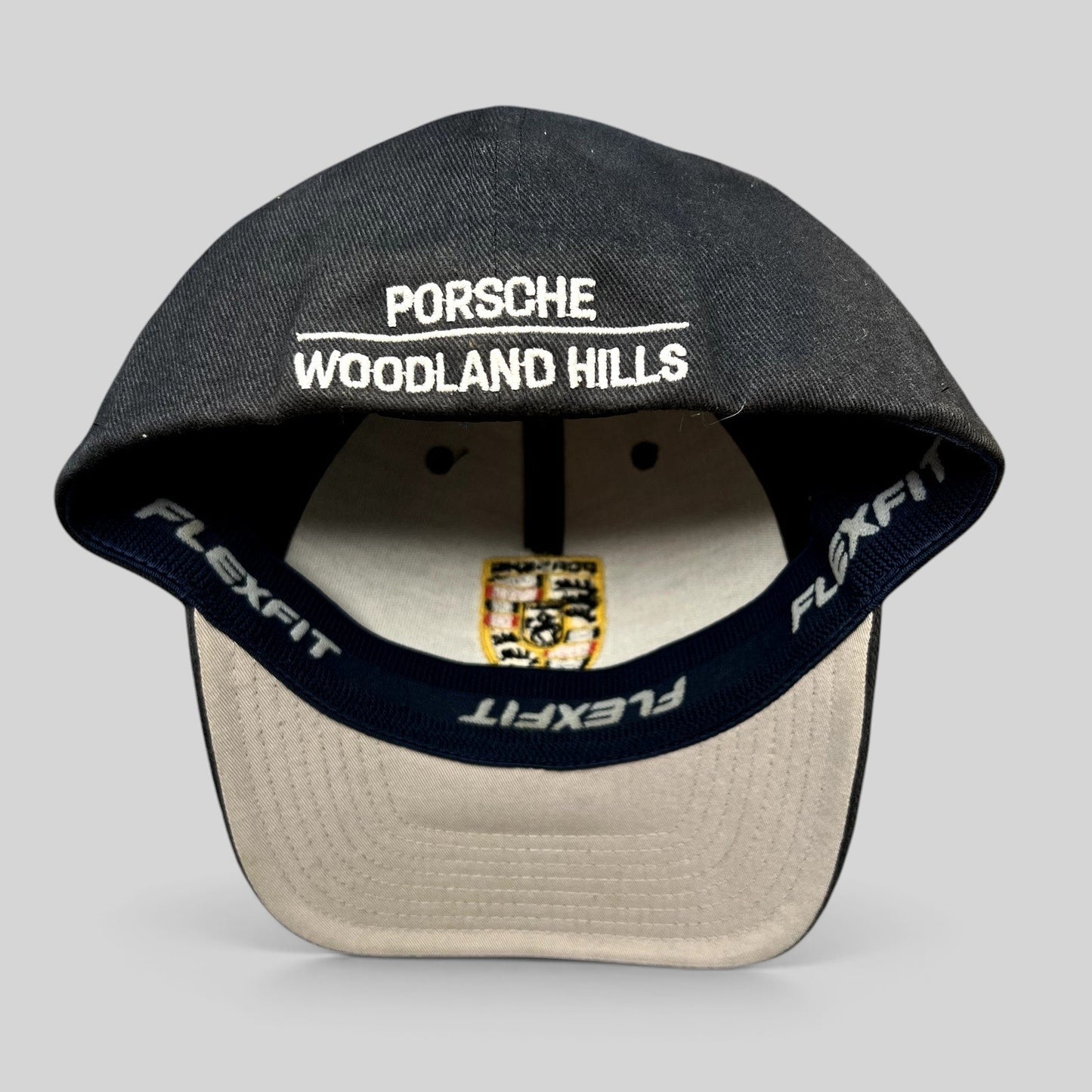 Raree Finds black Porsche Woodland Hills Flexfit cap showing interior embroidery and Porsche crest logo