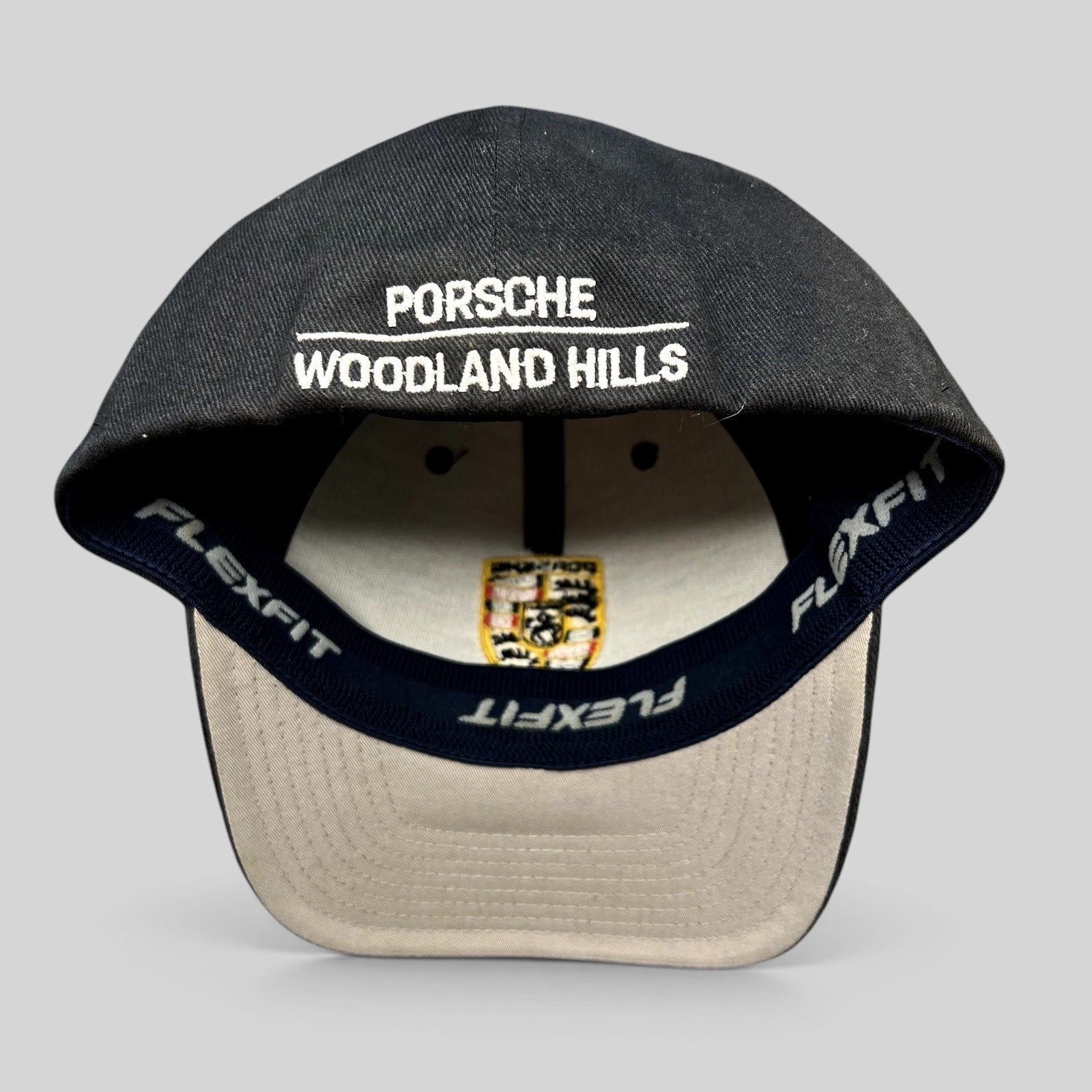 Raree Finds black Porsche Woodland Hills Flexfit cap showing interior embroidery and Porsche crest logo