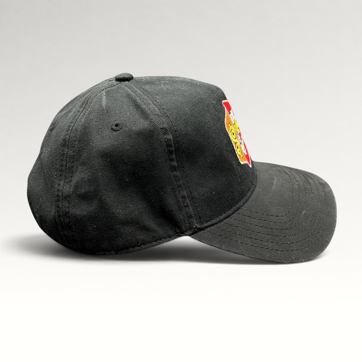 Raree Finds black cotton strapback hat with The Price Is Right game show logo embroidery and curved brim