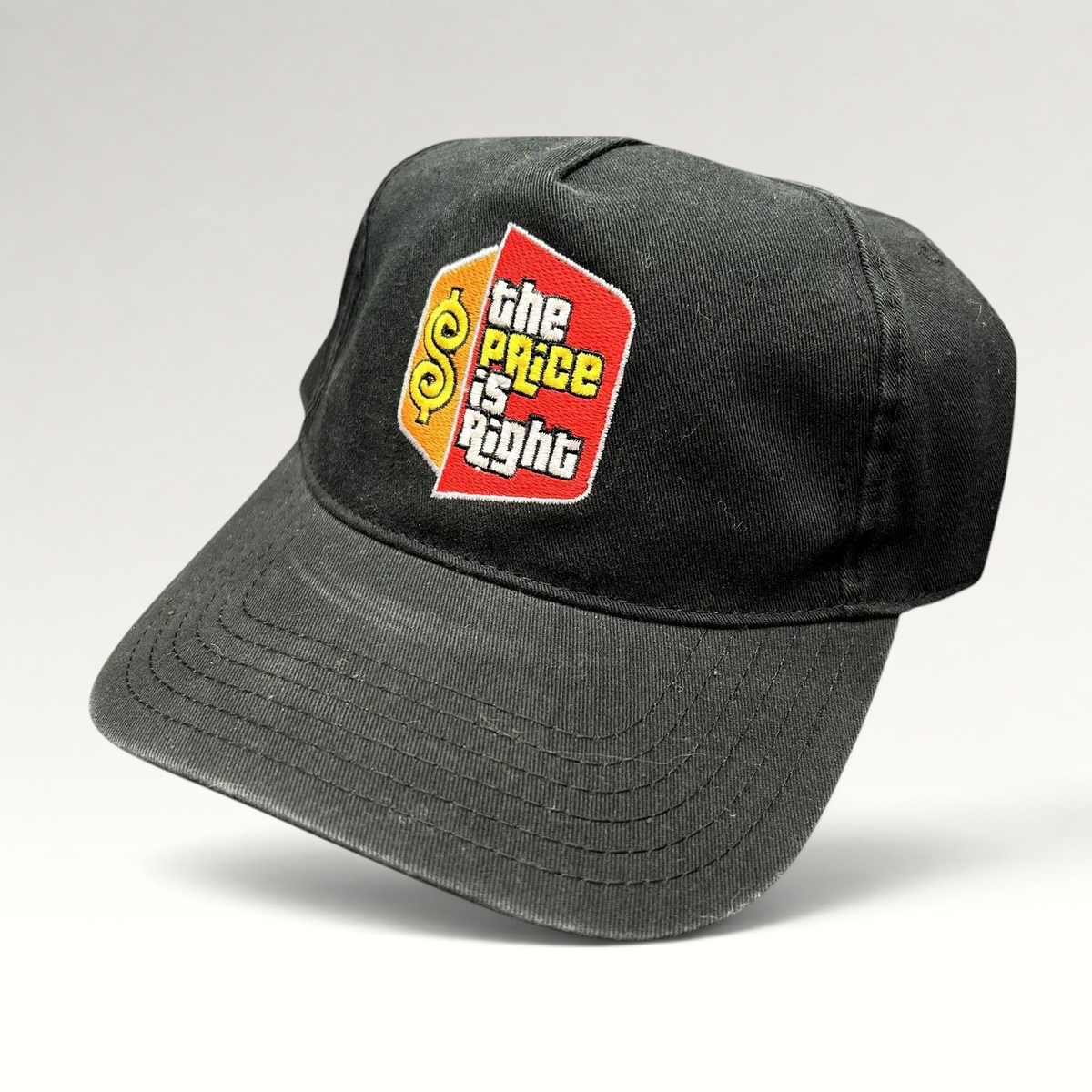 Raree Finds black cotton strapback hat featuring The Price Is Right embroidered game show logo on the front panel