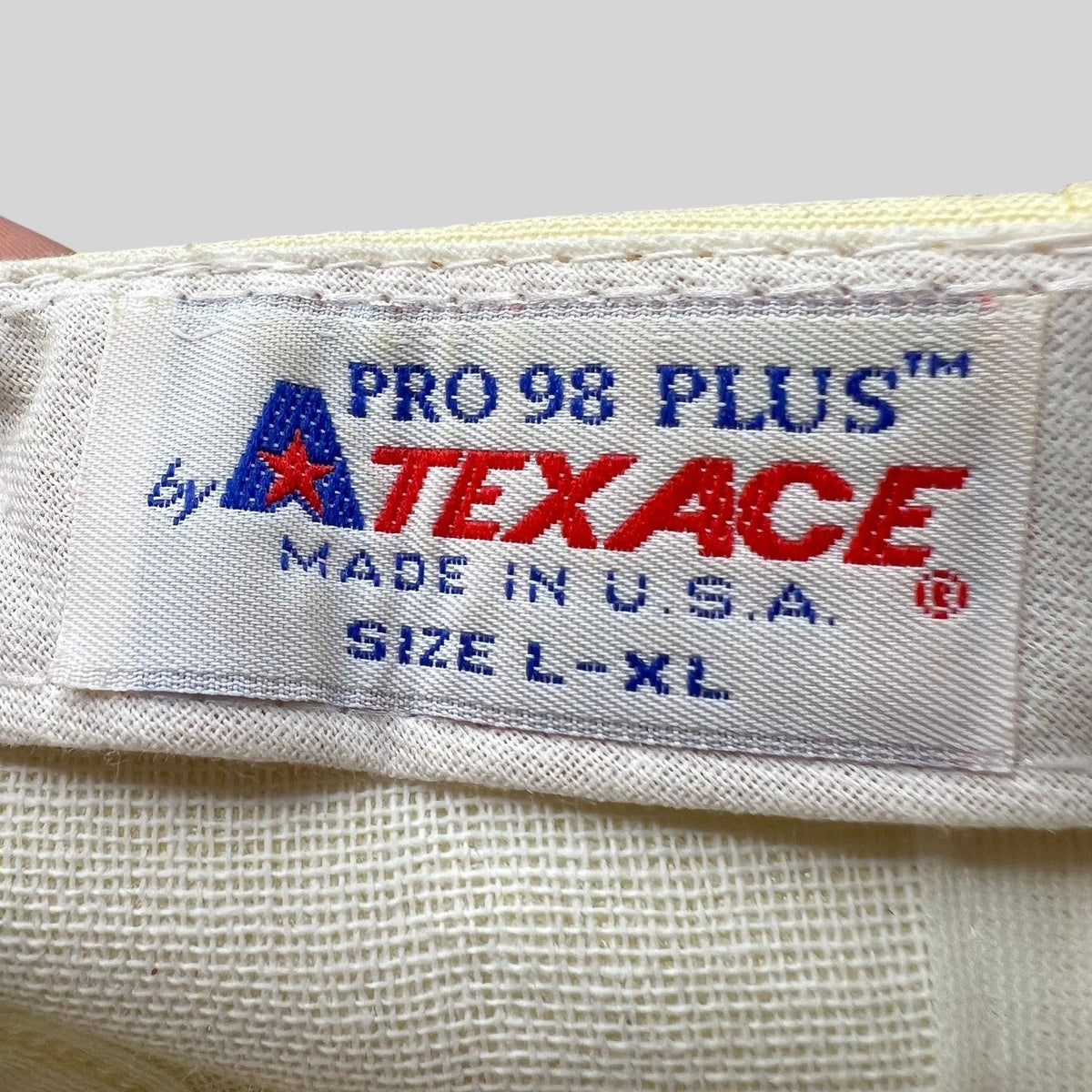 Raree Finds vintage Pro 98 Plus by Texace hat interior tag showing size L-XL and Made in USA construction