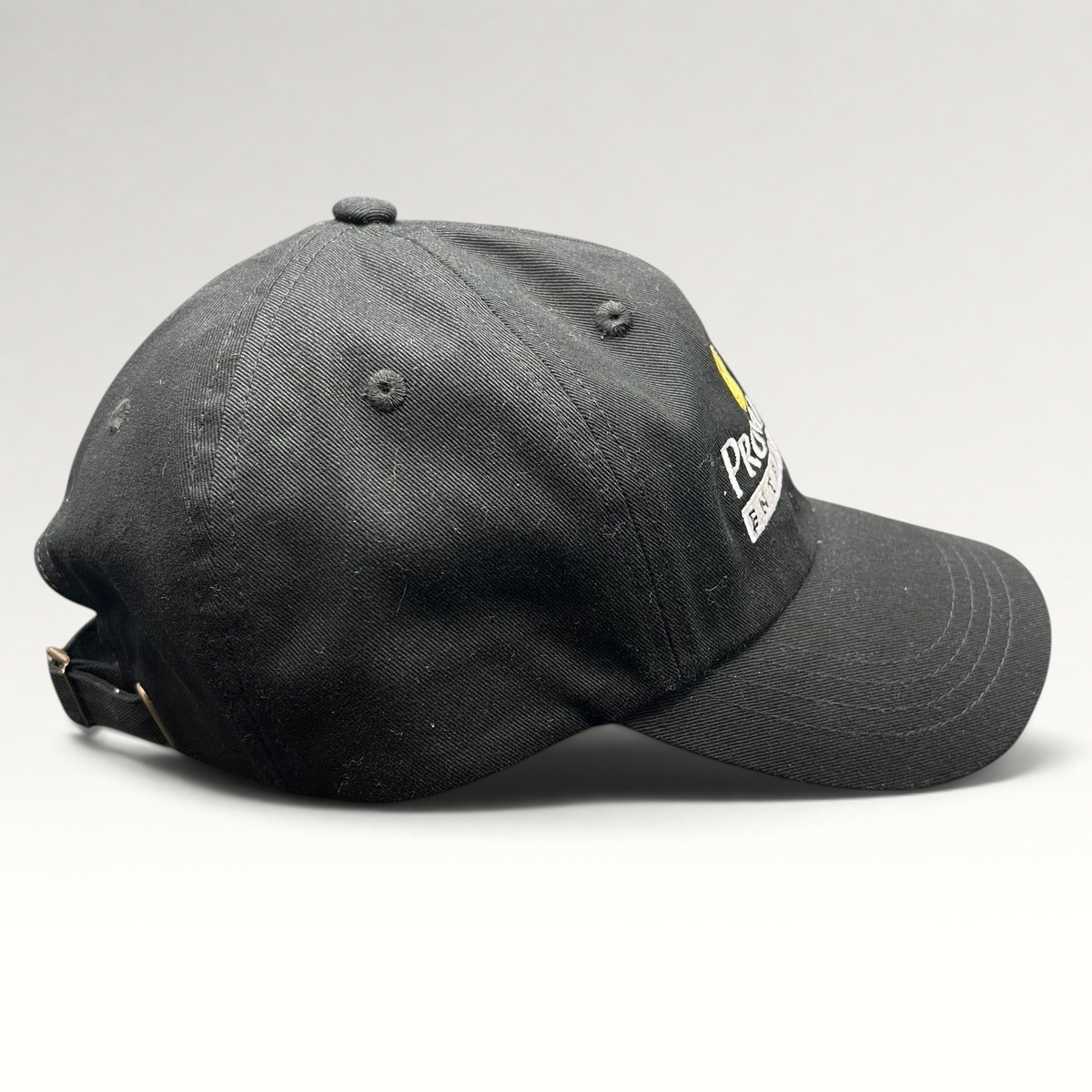 Raree Finds black Yupoong strapback hat with white and orange Prometheus Entertainment embroidered flame logo
