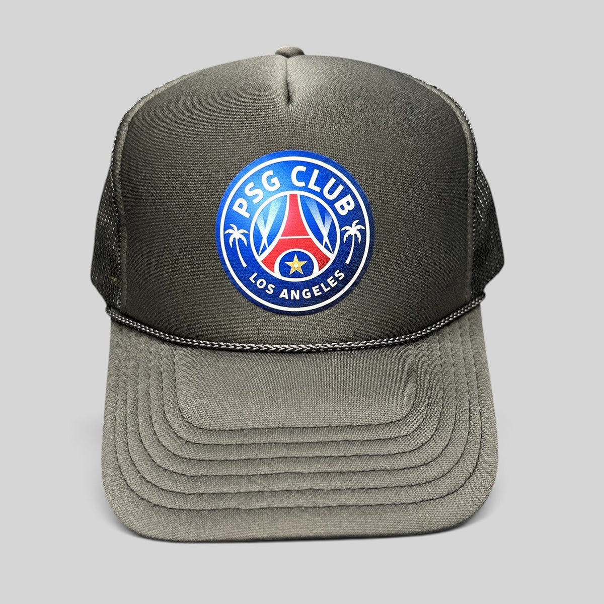 Raree Finds PSG Club Los Angeles trucker hat in charcoal gray and black with a soccer-inspired crest and mesh back.