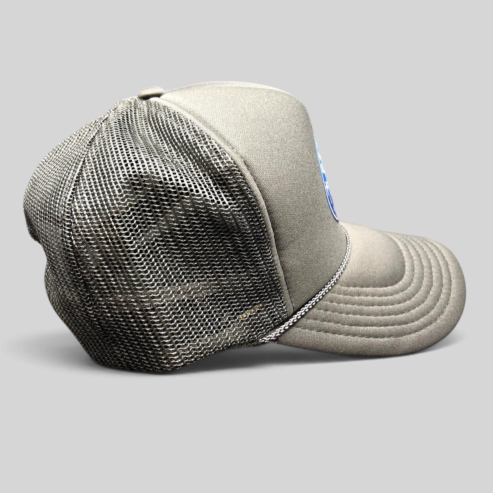 Raree Finds PSG Club Los Angeles trucker hat in charcoal gray with black mesh back and structured foam front panel
