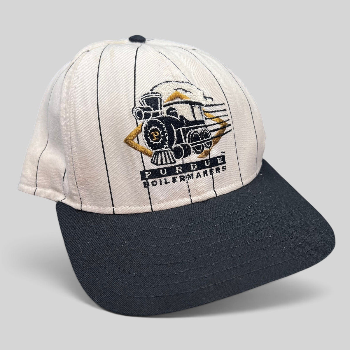 Raree Finds vintage Purdue Boilermakers snapback hat with white pinstripe crown, black bill, and embroidered train logo.