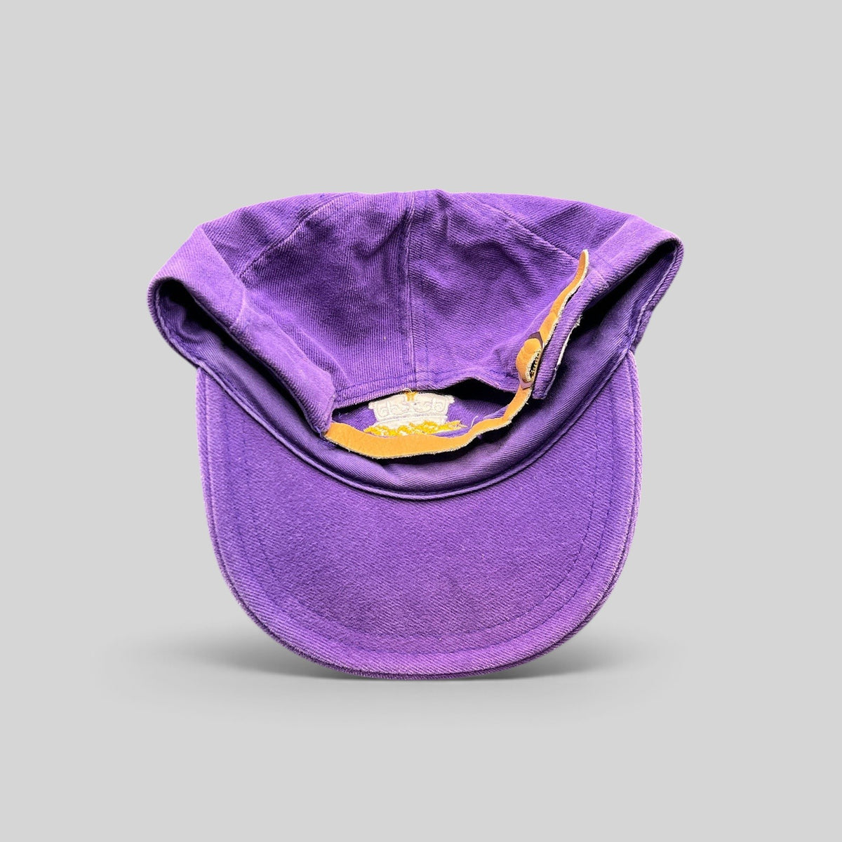 Raree Finds vintage purple cotton strapback hat with adjustable leather strap and brass buckle, interior view