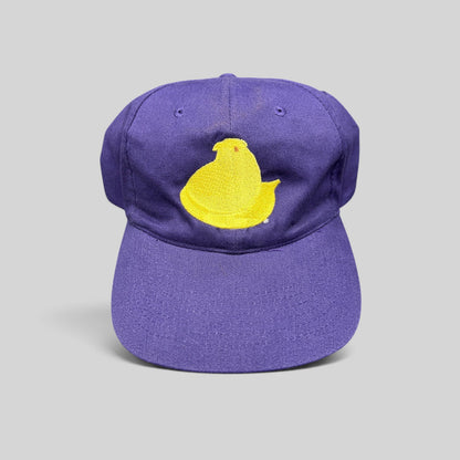 Raree Finds purple strapback hat featuring a yellow Marshmallow Peeps chick embroidered on the front