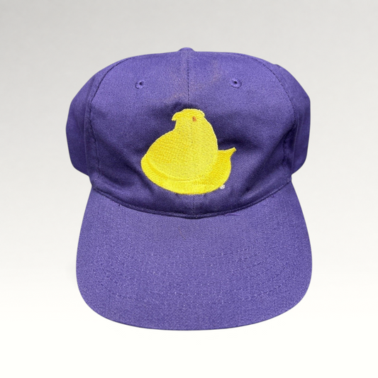 Raree Finds purple strapback hat featuring a yellow Marshmallow Peeps chick embroidered on the front