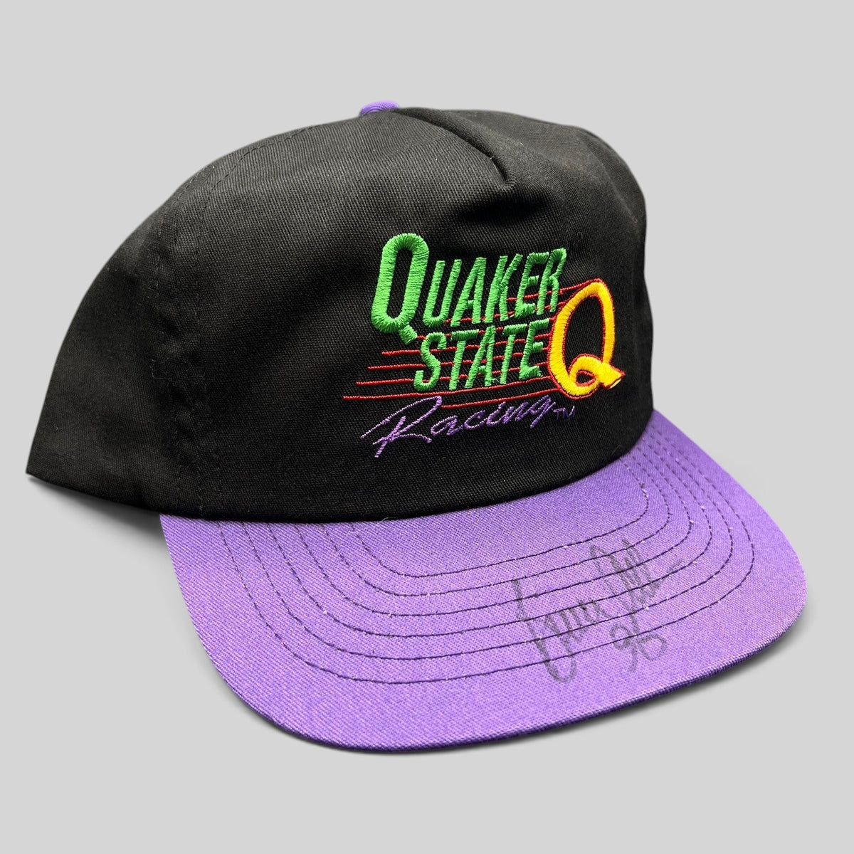 Raree Finds vintage 90s Quaker State Racing snapback hat with black crown, purple brim, and signed embroidery