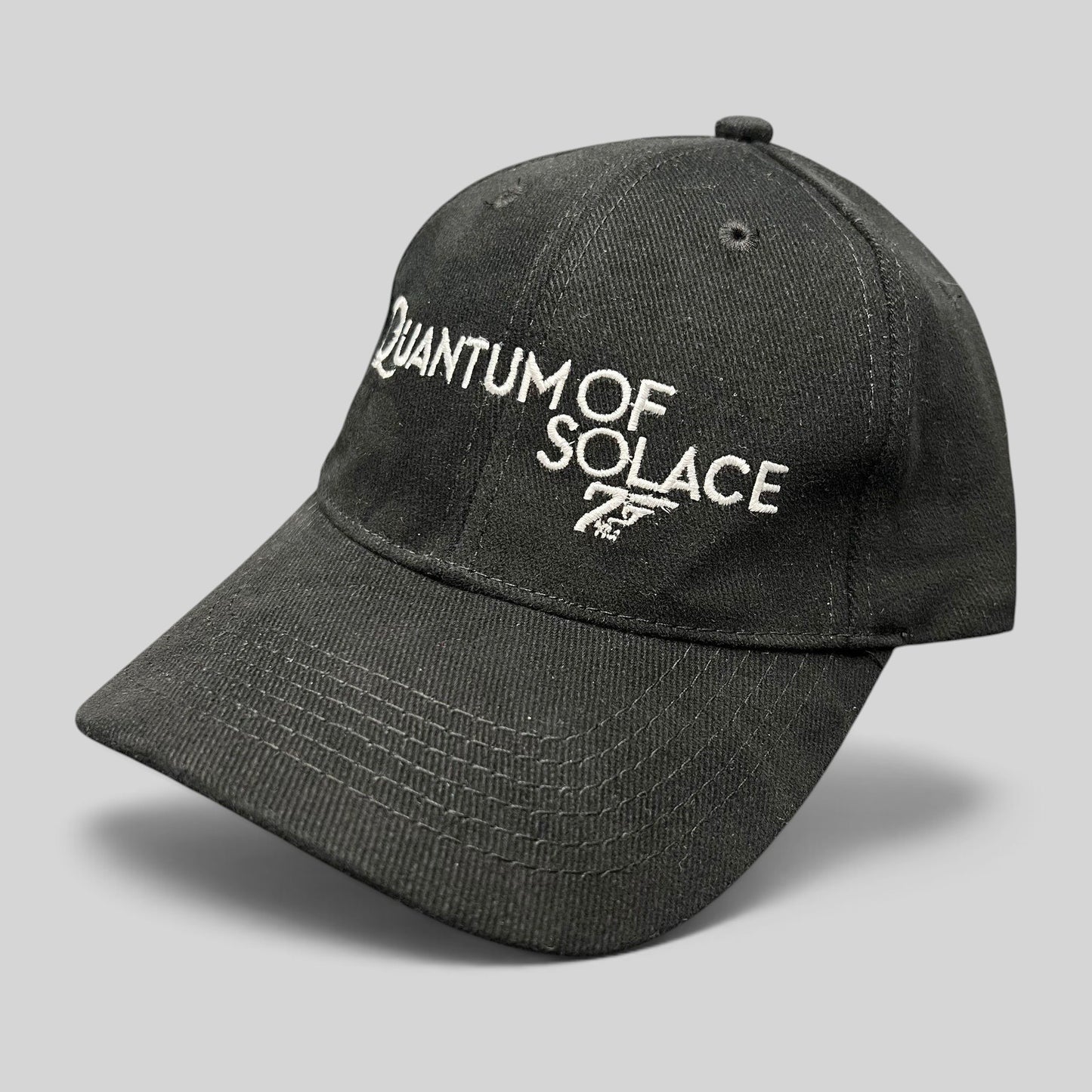 Raree Finds black Quantum of Solace 007 promotional strapback hat with white embroidered film logo on curved bill cap