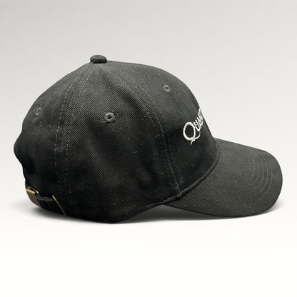 Raree Finds black Quantum of Solace 007 strapback hat with white embroidery and brass buckle side view