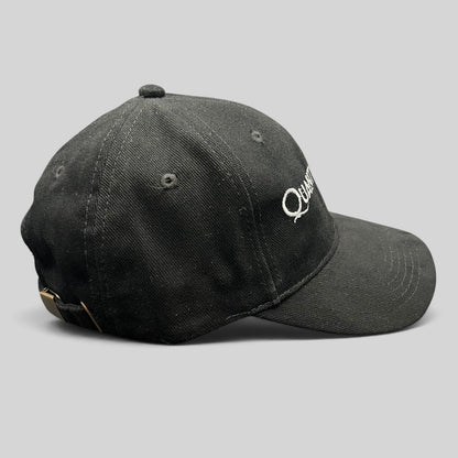 Raree Finds black Quantum of Solace 007 strapback hat with white embroidery and brass buckle side view
